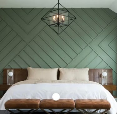 Green geometric accent wall with custom wood panels in a Monmouth County bedroom