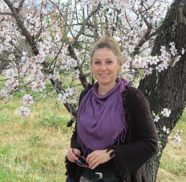 a woman in a purple scarf around her neck