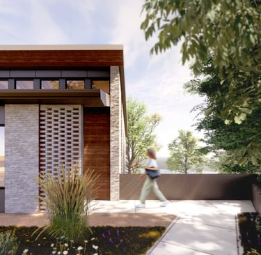 Exterior of a home, with a brick screen wall and wood accents