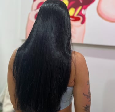 Long straight hair styled in Miami by Francis Hair & More for a sleek, natural look