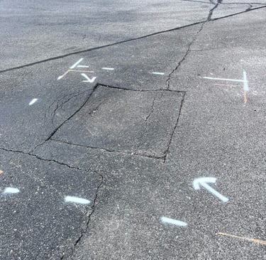 Localized asphalt pavement failure