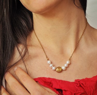 pearl necklace with stainless steel components. Jewelry care guide