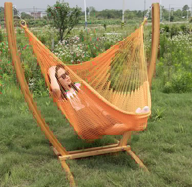 Orange hammock chair and wooden stand