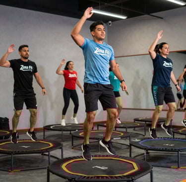 Peaceful yoga flow class with participants stretching gracefully in a sunlit studio.