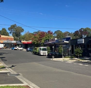 Paul Street shopping strip in Mooroolbark, KFC is on the other side of the road near the roundabouts with 3 islands