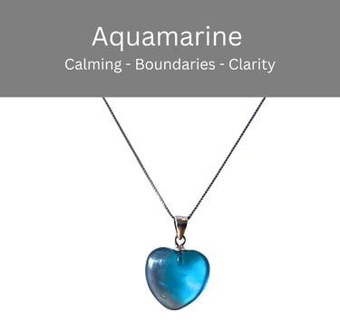 A heart-shaped blue aquamarine crystal pendant necklace for calming energy and clarity.