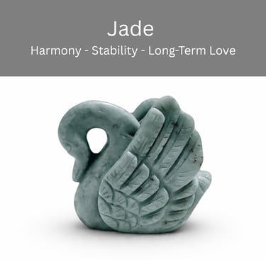 A hand-carved green jade swan figurine representing harmony, stability, and love.