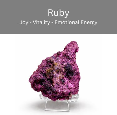 Raw pink ruby crystal specimen on a clear display stand with healing property keywords.