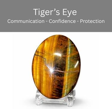 Polished oval Tiger's Eye crystal on a stand for confidence, protection, and communication.
