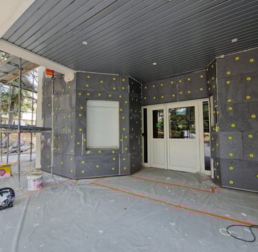 a house with a large window and a door