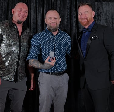 MMA coaches take a million view award for an athlete unable to attend International Podcast Awards