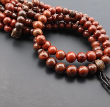 Vibrant jasper beads arranged artistically arranged.