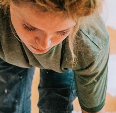 Woman working hard preparing her Highlands Ranch home for sale