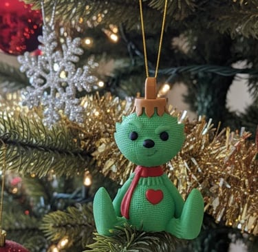 Grinch bauble with gold hanging tread