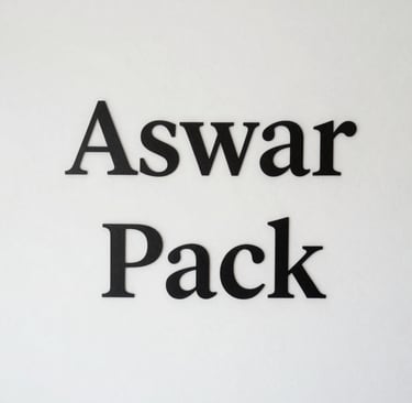 Photo of a confident man in casual tech attire, standing against a dark background with glowing blue accents.