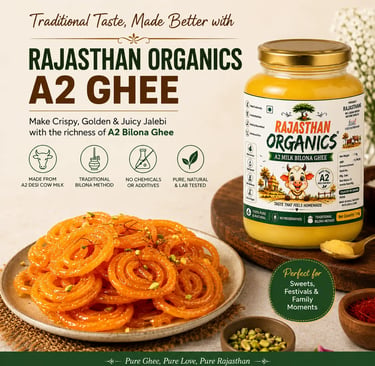 A jar of Rajasthan Organics A2 Bilona Ghee next to a plate of crispy golden jalebi sweets.