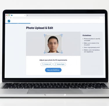 Person fixing an ID photo upload error on a clean laptop screen before submitting online.