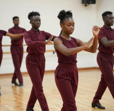 Children gathered around a pottery wheel, shaping clay with focused smiles in the ceramics class.