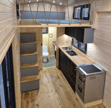Tiny house kitchen wooden walls
