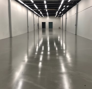 A bright kitchen countertop with sparkling clean surfaces and fresh utensils