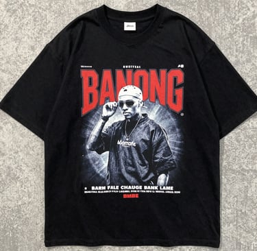  black oversized streetwear t-shirt with bold graphic print on a dark background