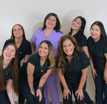 Professional dental team providing comprehensive patient care in Queens, New York