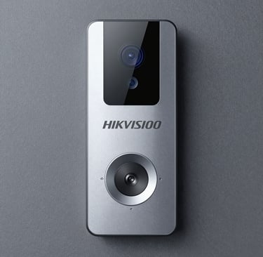 Technician installing a biometric access control system at a business entrance.