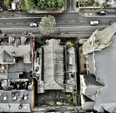 Aerial image of buildings showing roof and envelope condition