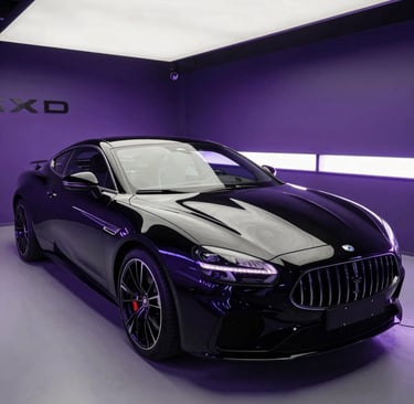 Sleek black luxury sports coupe parked in a modern showroom with purple neon lighting.