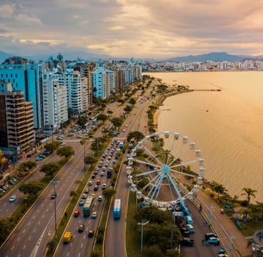 a cityscape of a ferris wheel in the middle of a city