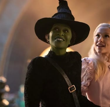 a woman dressed as a witch with a witch costume