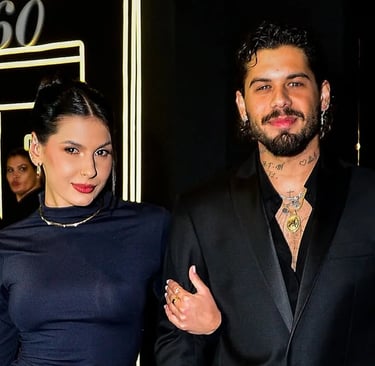 a man and woman standing next to each other