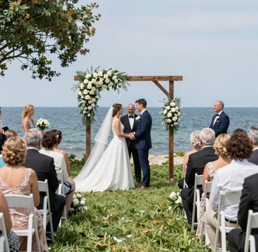 A little girl sitting in the grass waving