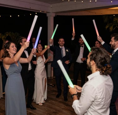 Outdoor table set for a banquet with food and decorations