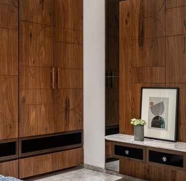 Custom wooden wardrobe with sliding doors and TV unit - Amuk Modular furniture manufacturer Pune