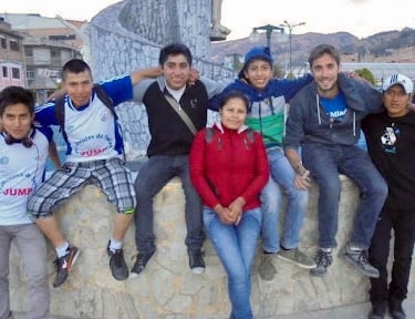 Jump Finance founder John William Meyer with original members of the Jump Youth Group in Peru