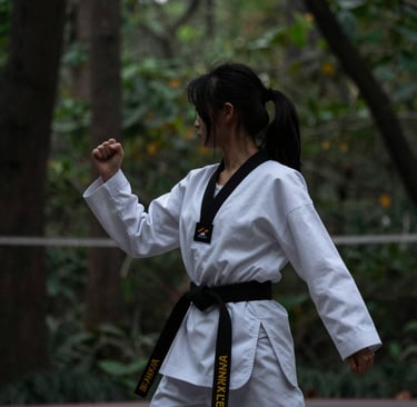 A misty forest path bathed in soft green light, evoking a fantasy novel setting.