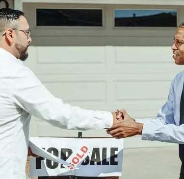 Two professionals closing a deal representing local market execution and on-ground support