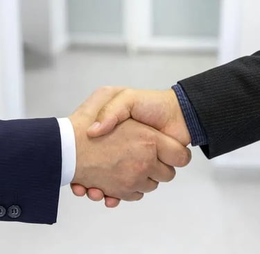 Handshake between business partners symbolizing strategic partnership and distribution agreements
