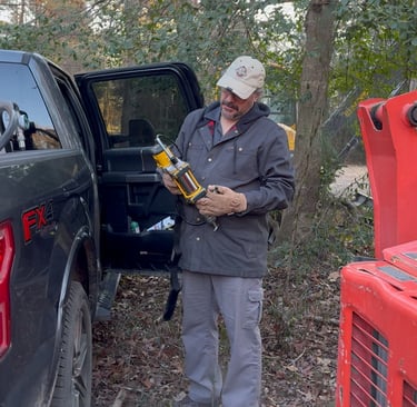 John trying to figure out the new DeWalt grease gun