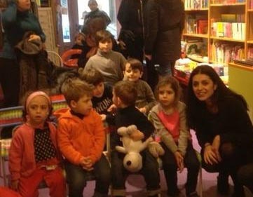 enfants participant à la lecture en musique de Eva Marchal