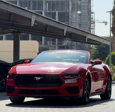 Red sports car luxury car rental Dubai premium performance vehicle