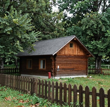 a yellow toilet sitting in the middle of a field
