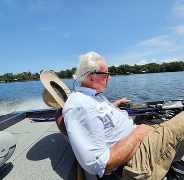 Larry sleeping in the boat