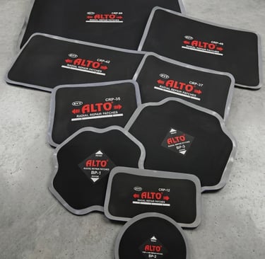 Selection of Alto radial tire repair patches in various sizes and shapes for professional automotive maintenance.