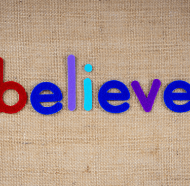a word written in the word believe on a canvas bag