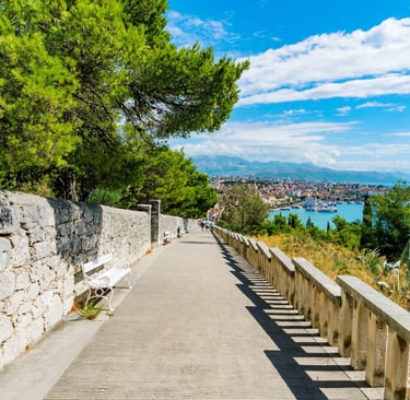 Scenic walking path on Marjan Hill overlooking the city and harbour of Split