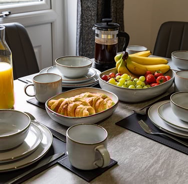 Dining area with crockery and untensils