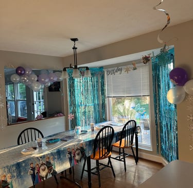 budget birthday party decorations balloons and happy birthday banner