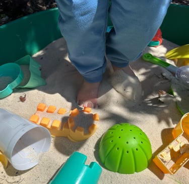 Toddler Outdoor Play in Sandbox